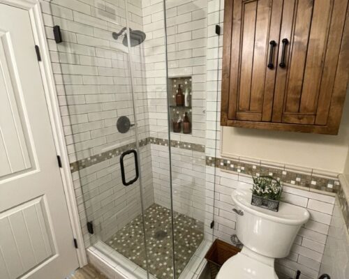 Modern bathroom with glass shower enclosure